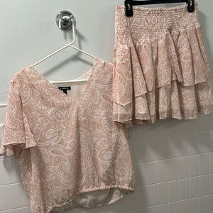 Matching blouse and skirt.